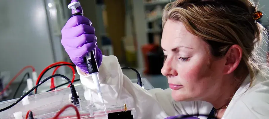 Woman with pipette