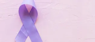 epilepsy awareness symbol on a pink backdrop