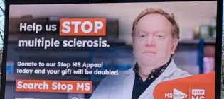 Stop MS billboard featuring Prof David Lyons