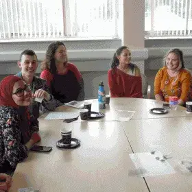 teaching group around table