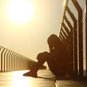 Photograph depicting a depressed adolescent